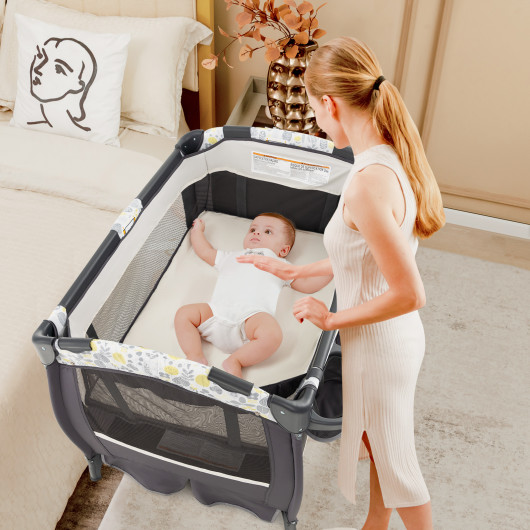4 in 1 Portable Pack and Play Baby Nursery Center with Bassinet-Yellow - Image 3